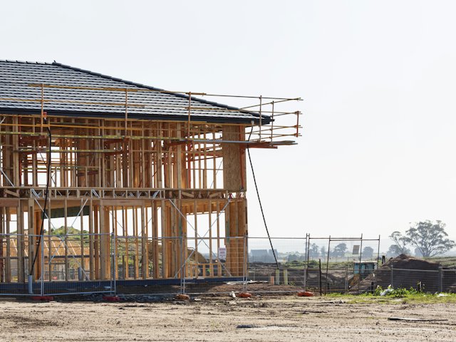 Sample photo: building with scaffolding for the upper floor